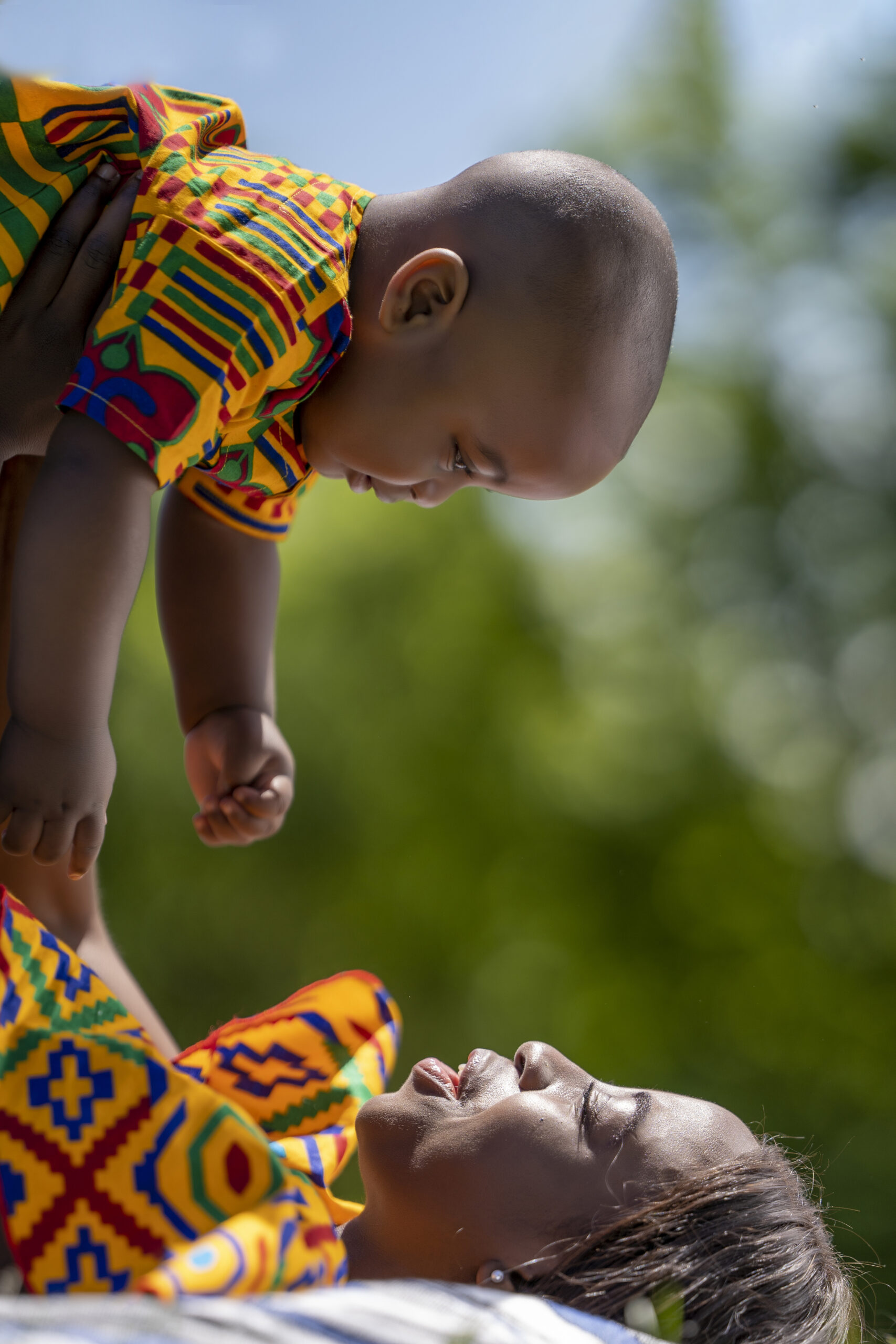 Little boy with his mother playing in the park